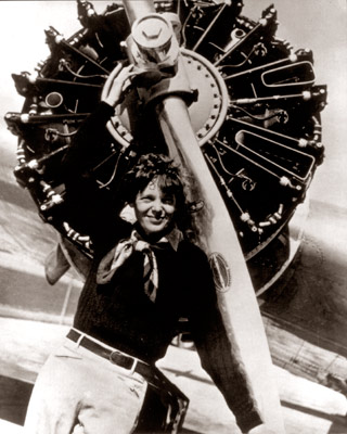 Amelia Earhart Poses In Front Of An Aeroplane Propeller C. 1943